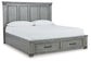 Russelyn California King Storage Bed with Mirrored Dresser